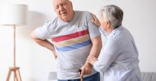 Senior man complaining of back pain.